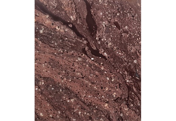 Okaz ryolitu z Gór Kaczawskich z iryzującymi skaleniami